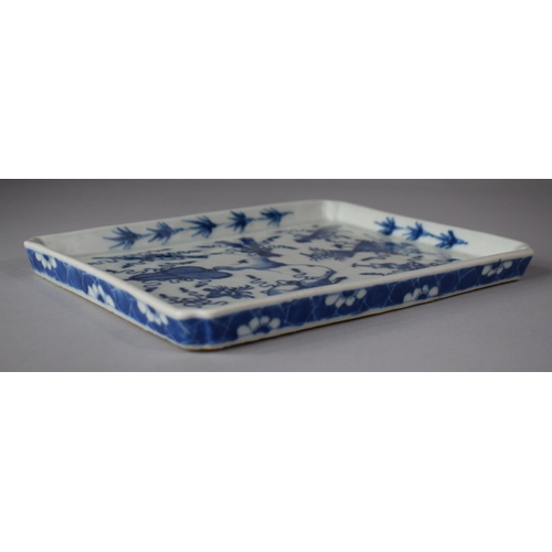 258 - A Chinese Blue and White Rectangular Tray Decorated with Interior Objects and Swags and Having Prunu... 