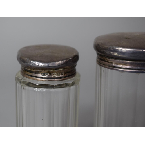 347 - Three Silver Topped Glass Dressing Table Pots