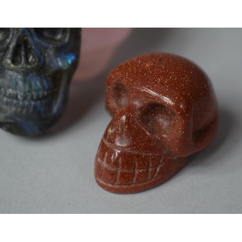 400 - A Collection of Three Carved Stone Skulls