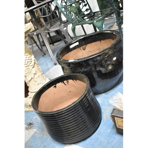 428 - Two Black Glazed Terracotta Patio Plant Pots, 52cm and 37cm Diameter