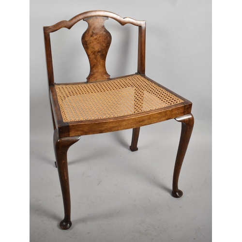 511 - An Edwardian Cane Seated Nursing Chair with Vase Splat