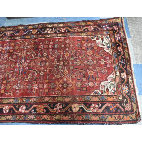 521 - An Antique Persian Handmade Brojerd Runner, 310x110cm