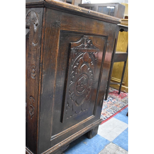 537 - A 19th century Oak Three Panelled Coffer Chest with Two Base Drawers, Later Carving, 119cm wide