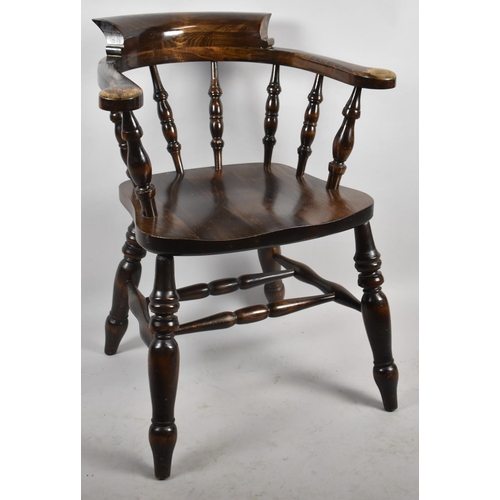 542 - A 20th Century Spindle Back Smokers Bow Armchair