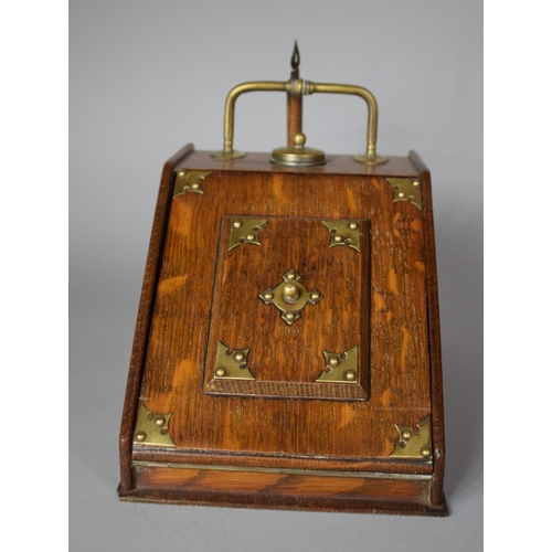 9 - A Late 19th Century Brass Mounted Oak Novelty Desk Top Ink and Stationery Stand in the Form of a Coa... 