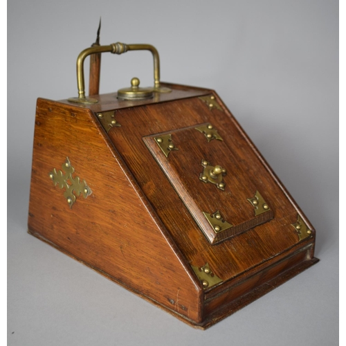 9 - A Late 19th Century Brass Mounted Oak Novelty Desk Top Ink and Stationery Stand in the Form of a Coa... 