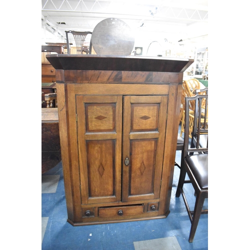 624 - A 19th Century Crossbanded Oak and Mahogany Wall Hanging Corner Cabinet with Centre Drawer Flanked b... 