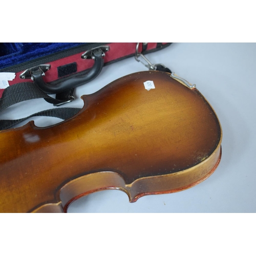 101 - An Early 20th Century Child's Spruce Topped Violin together with a Cased Smaller Example