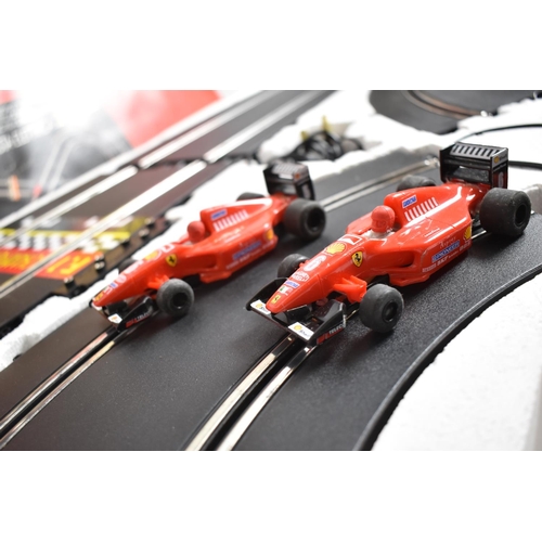 105 - A Boxed Formula One Professional Course Pista Ferrari Two Slot Car Set, Complete