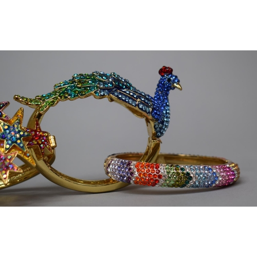 148 - Three Butler and Wilson Multi Coloured Jewelled Hinged Bangles to include Peacock, Starburst Example... 