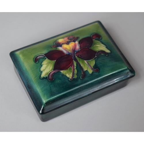 270 - A Moorcroft Rectangular Lidded Box with Hibiscus Flower Decoration, 12cms Long