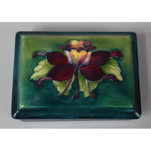 270 - A Moorcroft Rectangular Lidded Box with Hibiscus Flower Decoration, 12cms Long