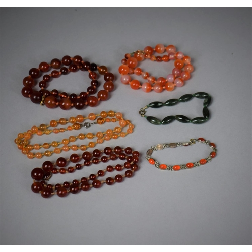 305 - Four Strings of Carnelian Beads, One with Nice Quality 9ct Gold Clasp. A Silver Mounted Carnelian Be... 