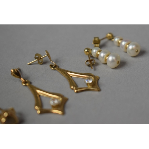 312 - Three Pairs of Yellow Metal Earrings, Jewelled Examples and a Pair having Graduated Pearls