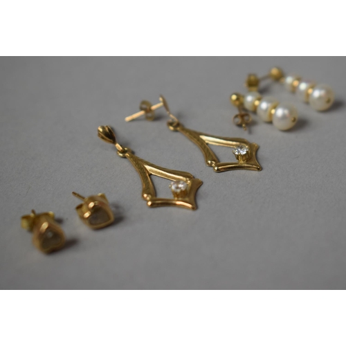 312 - Three Pairs of Yellow Metal Earrings, Jewelled Examples and a Pair having Graduated Pearls