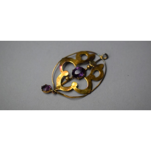 314 - An Edwardian 9ct Gold and Purple Stone Pendant, 1.2gms