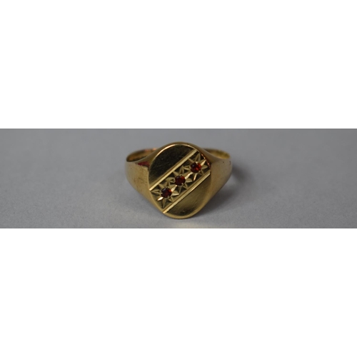 315 - A 9ct Gold and Garnet Signet Ring, 2.4gms