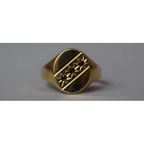 315 - A 9ct Gold and Garnet Signet Ring, 2.4gms