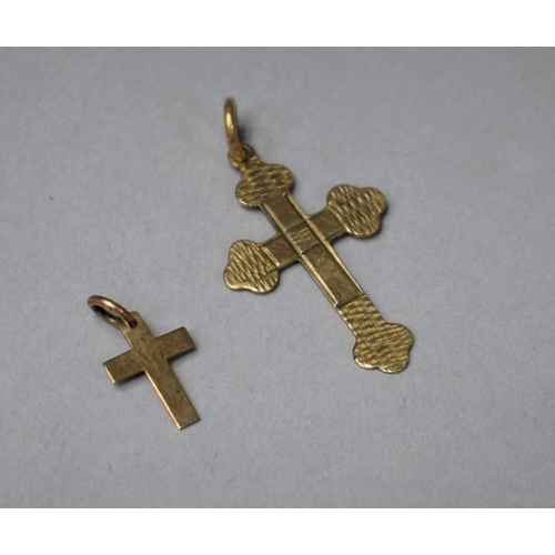 319 - Two Gold Crucifix Pendants, Total Weight .7gms