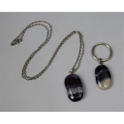 324 - A Blue John Pendant on White Metal Chain together with a Similar Example