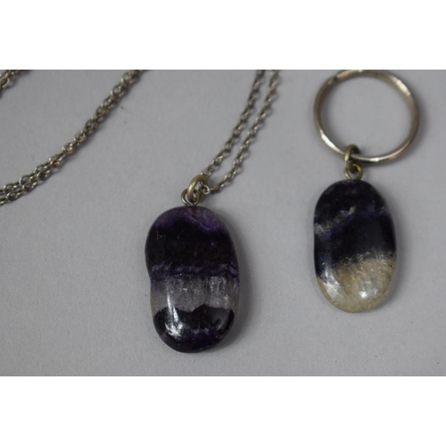 324 - A Blue John Pendant on White Metal Chain together with a Similar Example