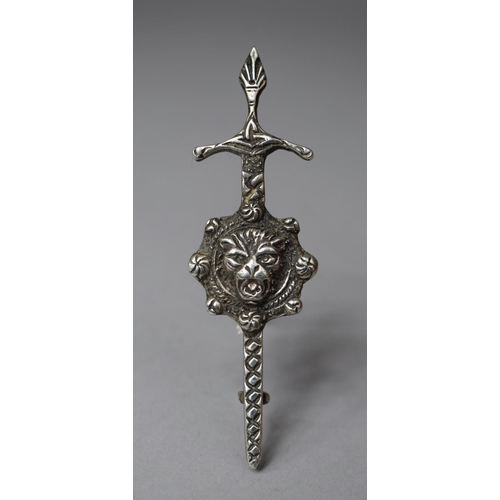 327 - A Silver Brooch with Silver Sword and Lion Head, 8cms Wide