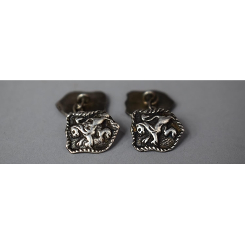 328 - A Pair of Silver Cufflinks with Shield and Lion Motif