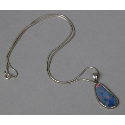 329 - A Pretty Ammolite or Opal Pendant on Silver Chain, Pendant 2.5x1.4cms