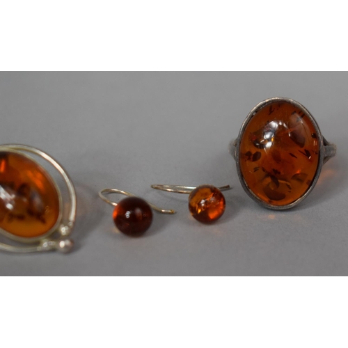 340 - A Collection of Amber Jewellery including Two  pairs of Earrings and a White Metal Mounted Ring