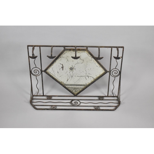 352 - An Early 20th Century Wrought Iron Coat Rack with Diamond Shaped Mirror, 75cms Wide