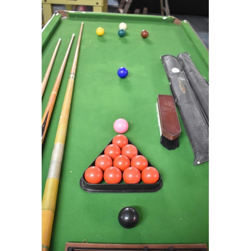 385 - A Snooker Table with Folding Legs complete with Cues, Balls Etc