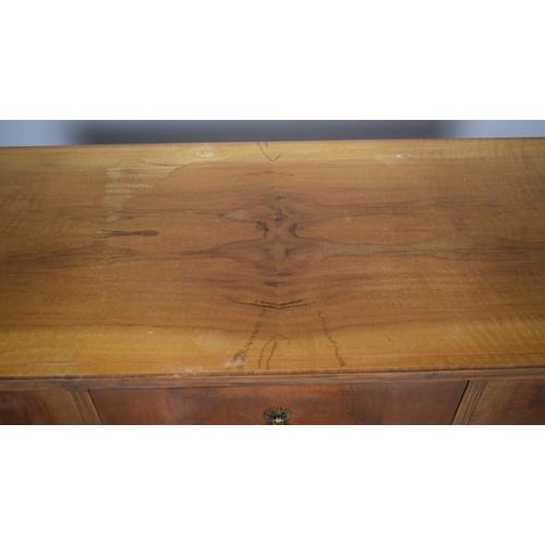 42 - A 20th Century Walnut Ladies Writing Desk with Centre Drawer Flanked by Two Banks of Small Drawers, ... 