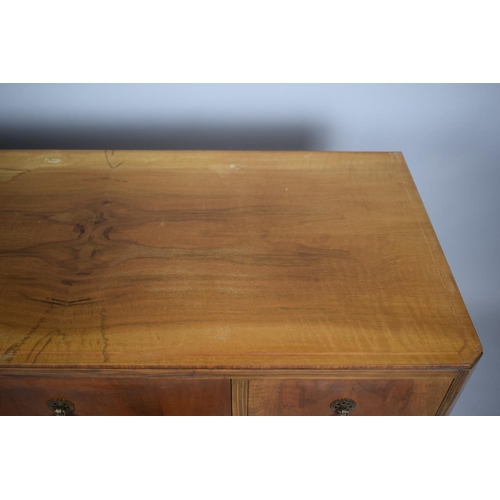 42 - A 20th Century Walnut Ladies Writing Desk with Centre Drawer Flanked by Two Banks of Small Drawers, ... 