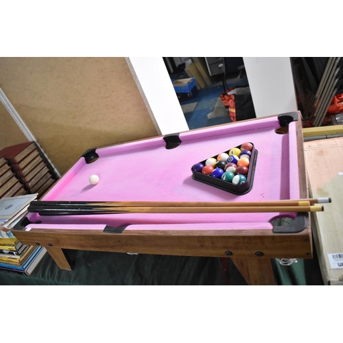 421 - A Small Table Top Pool Game Complete with Cues and Balls, 51 cms Wide