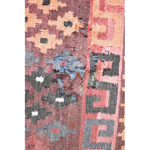 438 - A Turkish Kilim Carpet with Two Central Lozenge Shaped Medallion Design, 189x313cms, worn