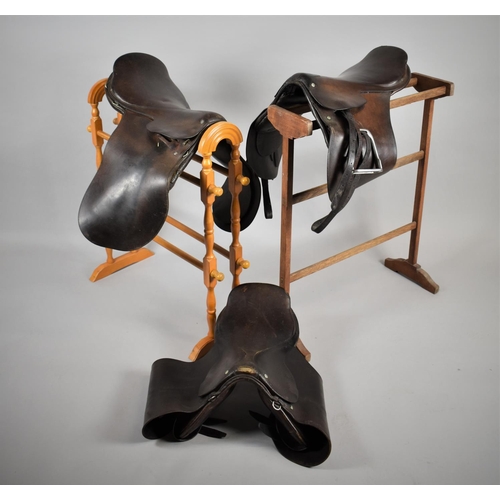 442 - Three Vintage Leather Saddles to include Examples by Barnsby and Son and Moss Bros Saddlers Etc