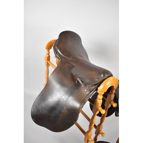 442 - Three Vintage Leather Saddles to include Examples by Barnsby and Son and Moss Bros Saddlers Etc