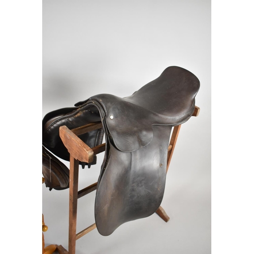 443 - A Vintage Leather Saddle by Whippy and Co together with Another Example