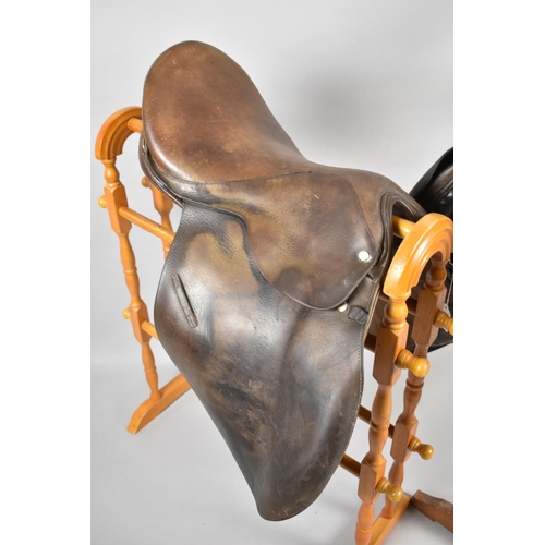 443 - A Vintage Leather Saddle by Whippy and Co together with Another Example