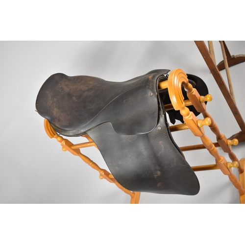 445 - A Collection of Three Vintage Leather Saddles