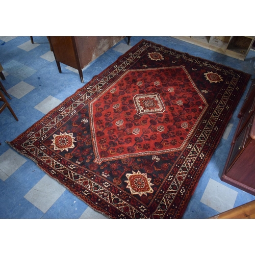 465 - A Persian Pattern Rug on Red Ground, 313x211cm