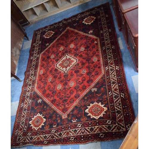 465 - A Persian Pattern Rug on Red Ground, 313x211cm