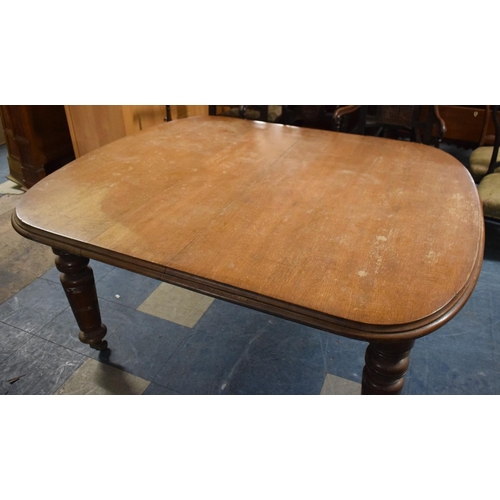 492 - A Late Victorian Mahogany Dining Table on Turned Bulbous Tapering Supports, Extending Wind Out Mecha... 