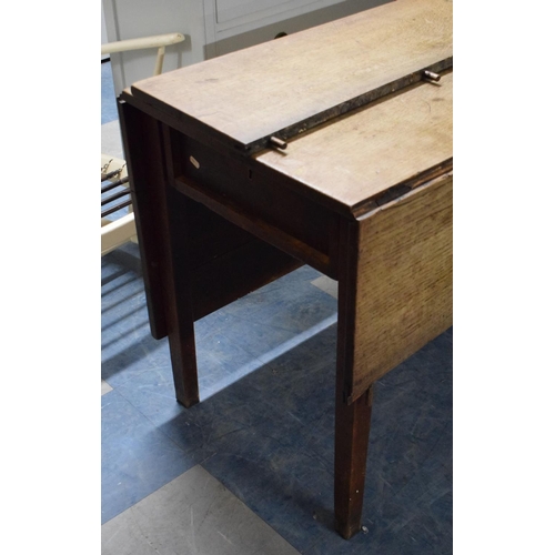 494 - A Late 18th/19th Century Drop Leaf Table, in Need of Complete Restoration