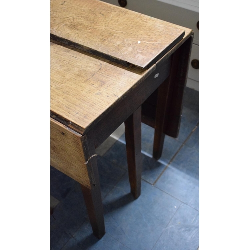 494 - A Late 18th/19th Century Drop Leaf Table, in Need of Complete Restoration