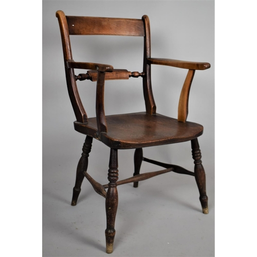 496 - A 19th Century Armchair with Late Georgian Style Back Support and Turned Wooden Legs