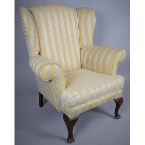 497 - An Upholstered Wing Armchair