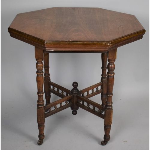 498 - An Edwardian Mahogany Hexagonal Topped Table on Turned Caster Supports and Spindled Stretcher, 45cm ... 