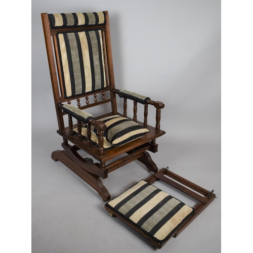 502 - A Upholstered American Rocker Chair with Pull Out Footrest