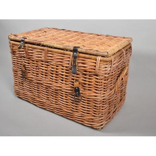 506 - A Large Wicker Hamper with Leather Straps and Two Carrying Handles to Sides